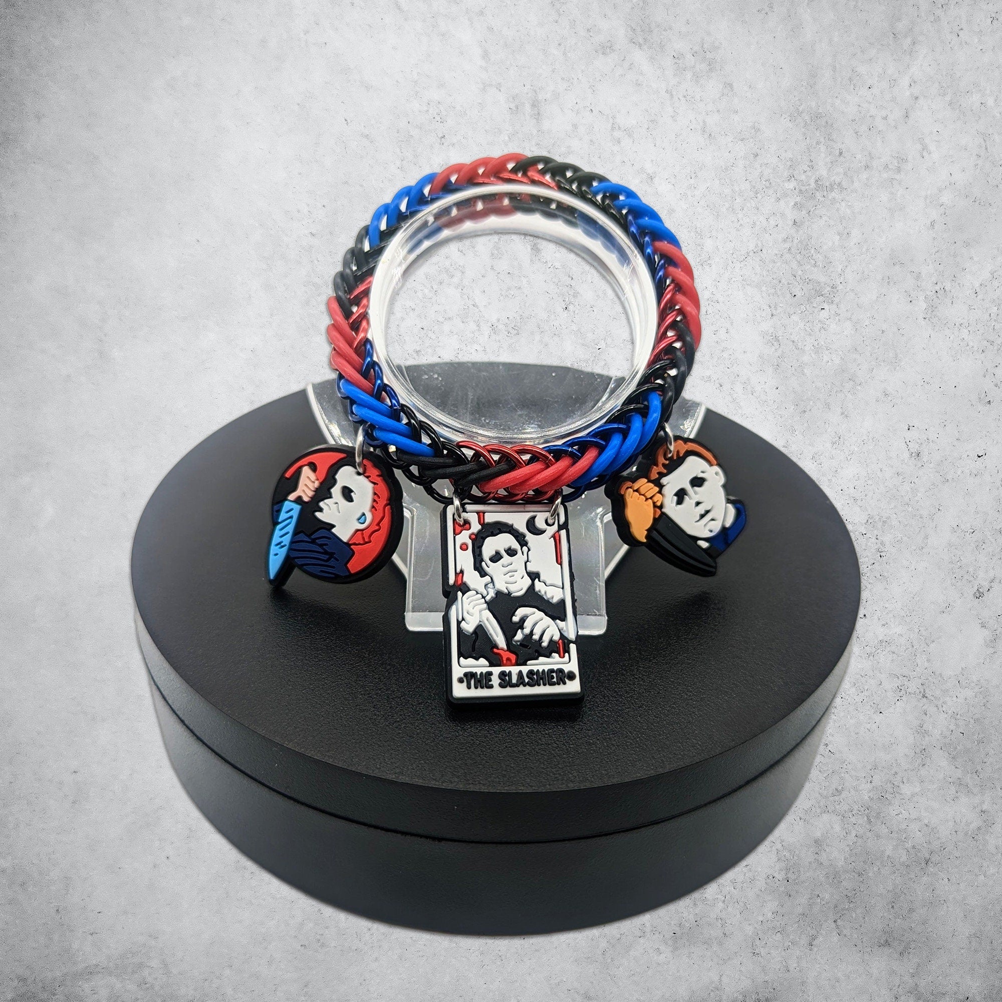 Blue & Red Slasher Bracelet Place in Revolving Stand 
