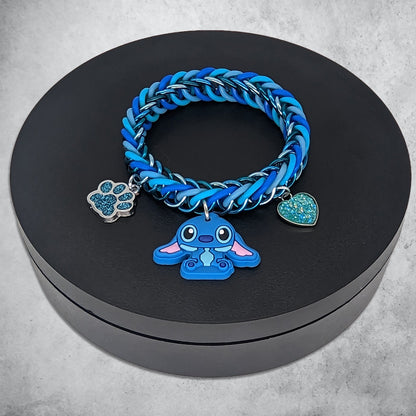 Blue Alien Charm Bracelet Place in Black Revolving Stand