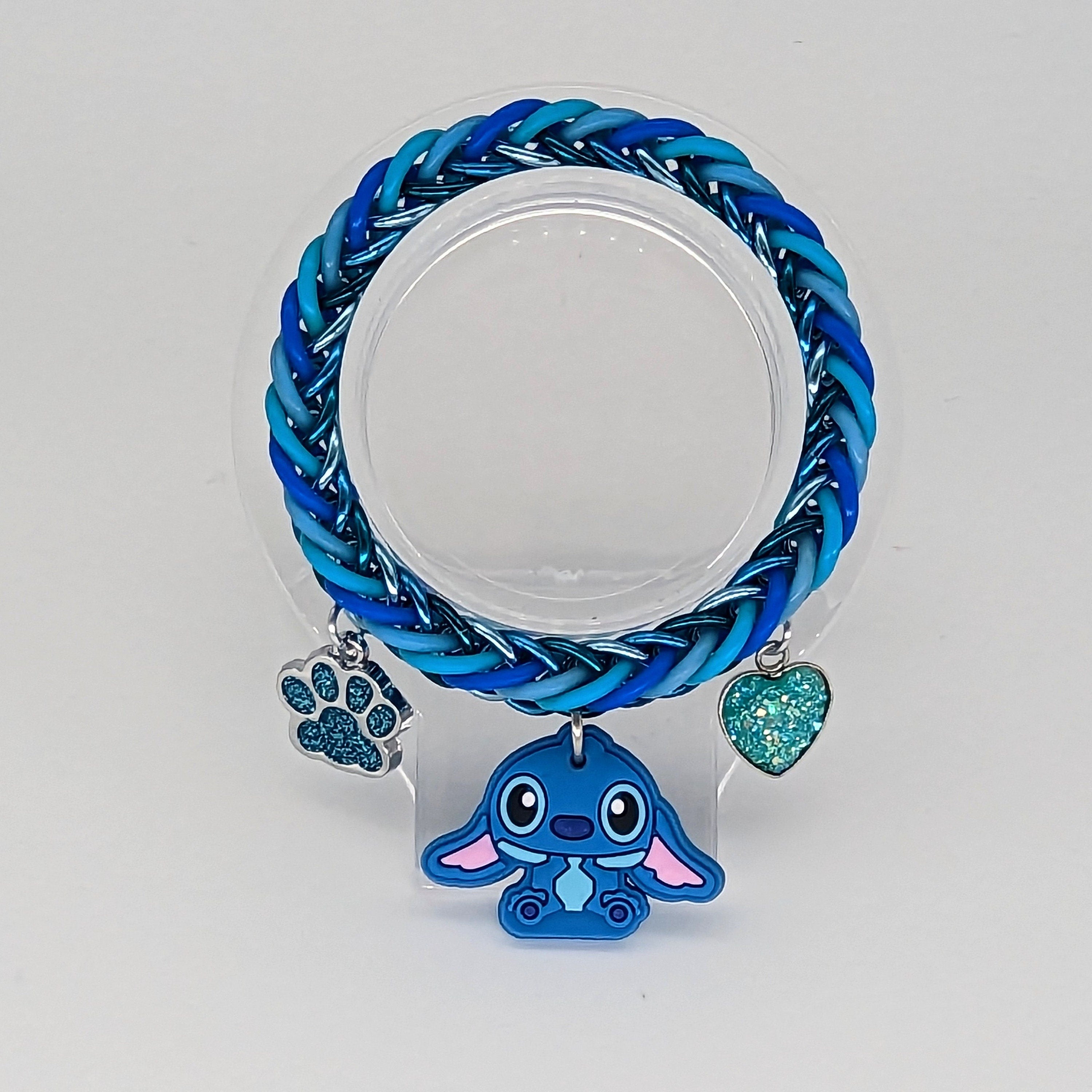 Blue Alien Charm Bracelet Place in Transparent Stand