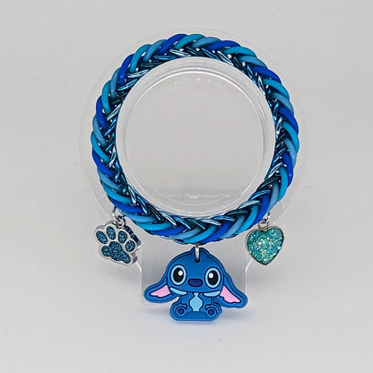 Blue Alien Charm Bracelet Place in Transparent Stand